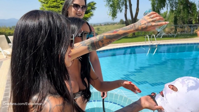 Evil Woman – Using house slave by 3 dommes on the pool